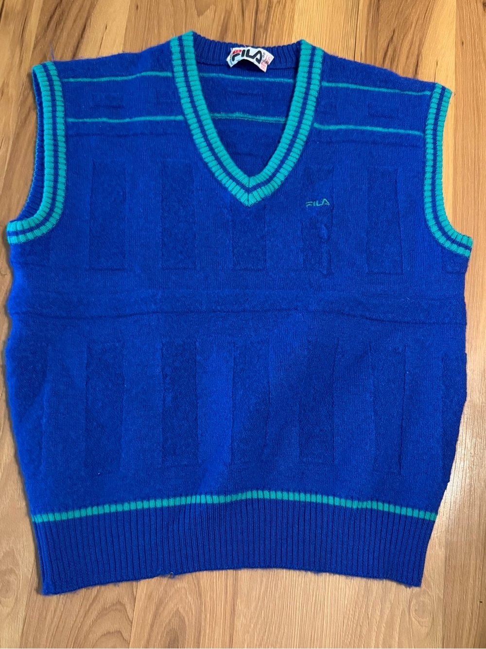 Vintage Fila Men’s Blue V-Neck Sweater Vest with Teal Trim